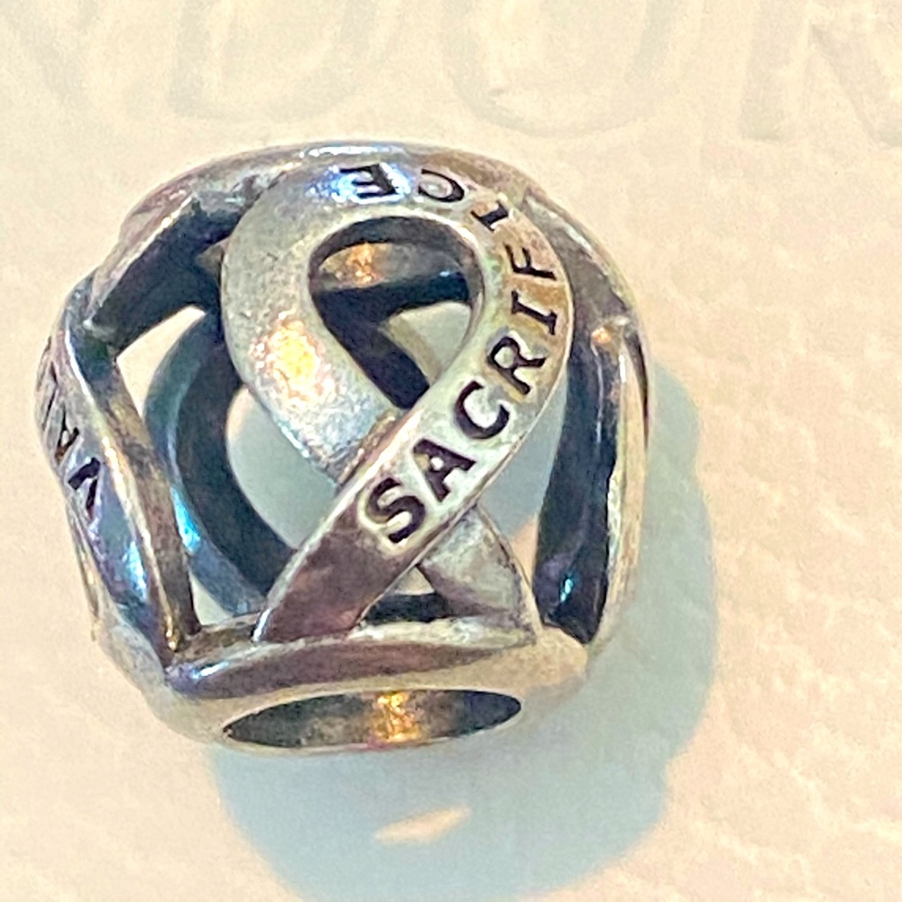Pandora sacrifice ribbon charm